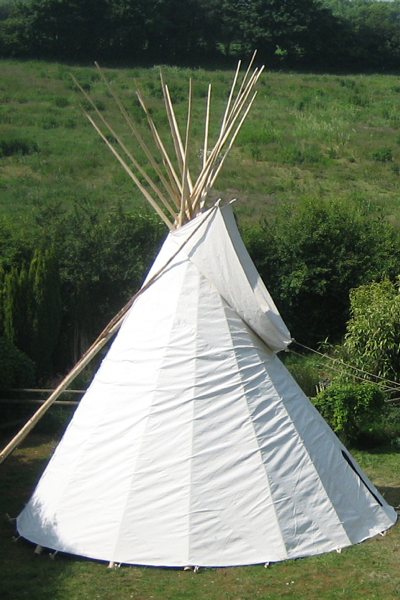 tipi construction stagee 3 - canvas added to tipi poles