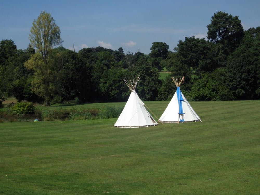 Big-Hill-Tipis-2-Tipis-in Field.JPG